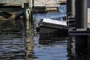 Marina Trash Skimmer attached to dock